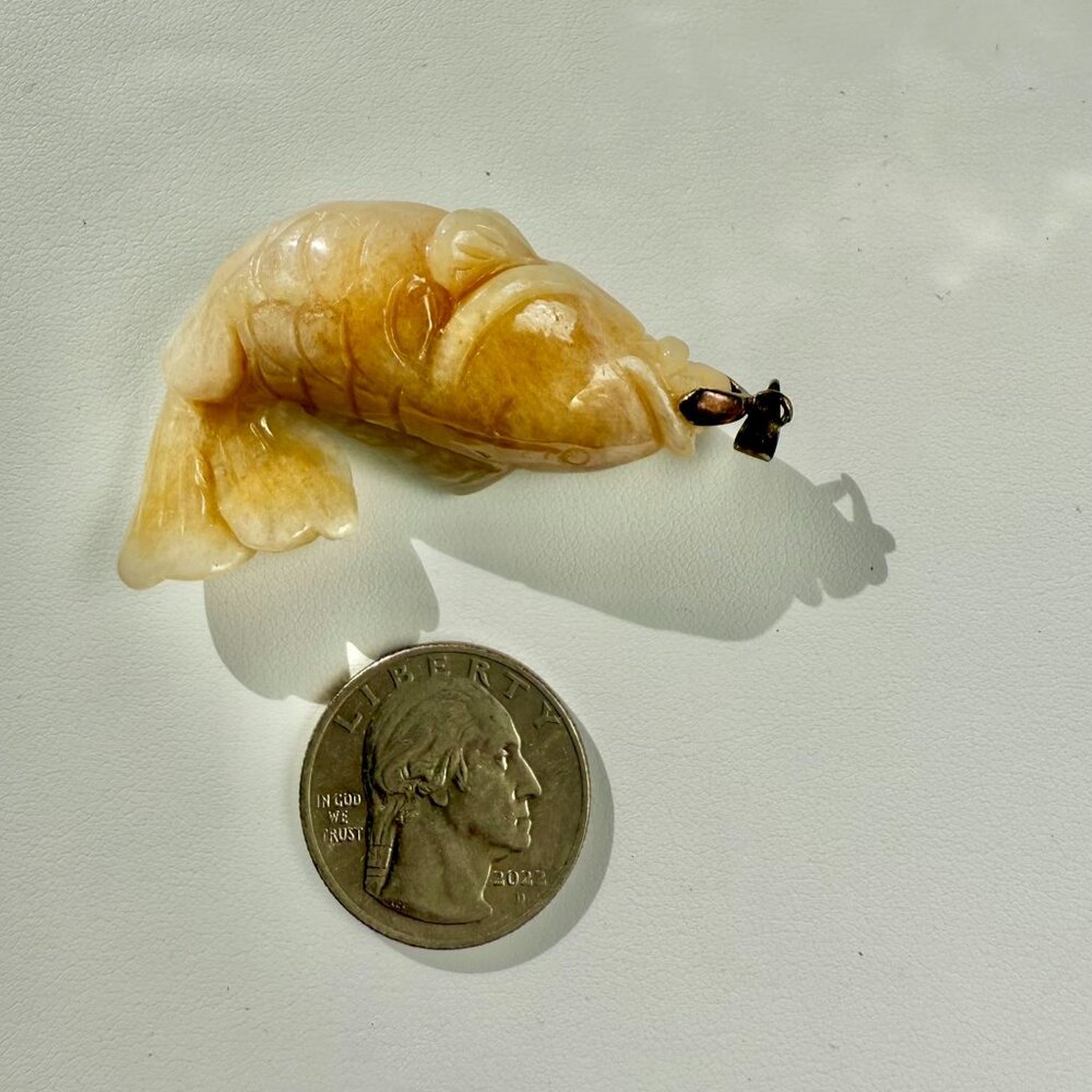 Hand carved jade koi fish pendant